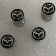 Load image into Gallery viewer, Set of 4 Universal Mazda Silver Wheel Stem Air Valve Caps 47000ac9