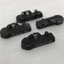 Load image into Gallery viewer, Set of 4 Ford TPMS Sensor 315 Mhz DE8T-1A180-AA f04e7713
