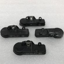 Load image into Gallery viewer, Set of 4 Ford TPMS Sensor 315 Mhz DE8T-1A180-AA f04e7713