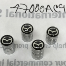 Load image into Gallery viewer, Set of 4 Universal Mazda Silver Wheel Stem Air Valve Caps 47000ac9